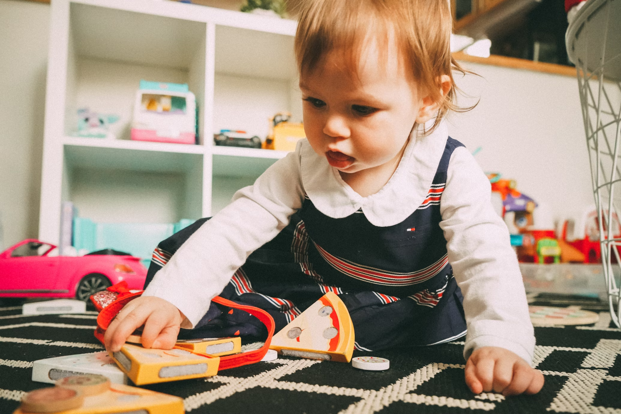 A toddler playing on the floor